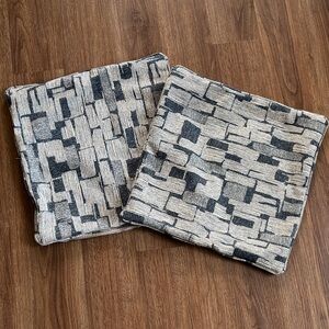 2 Geometric Patterned Throw Pillows
